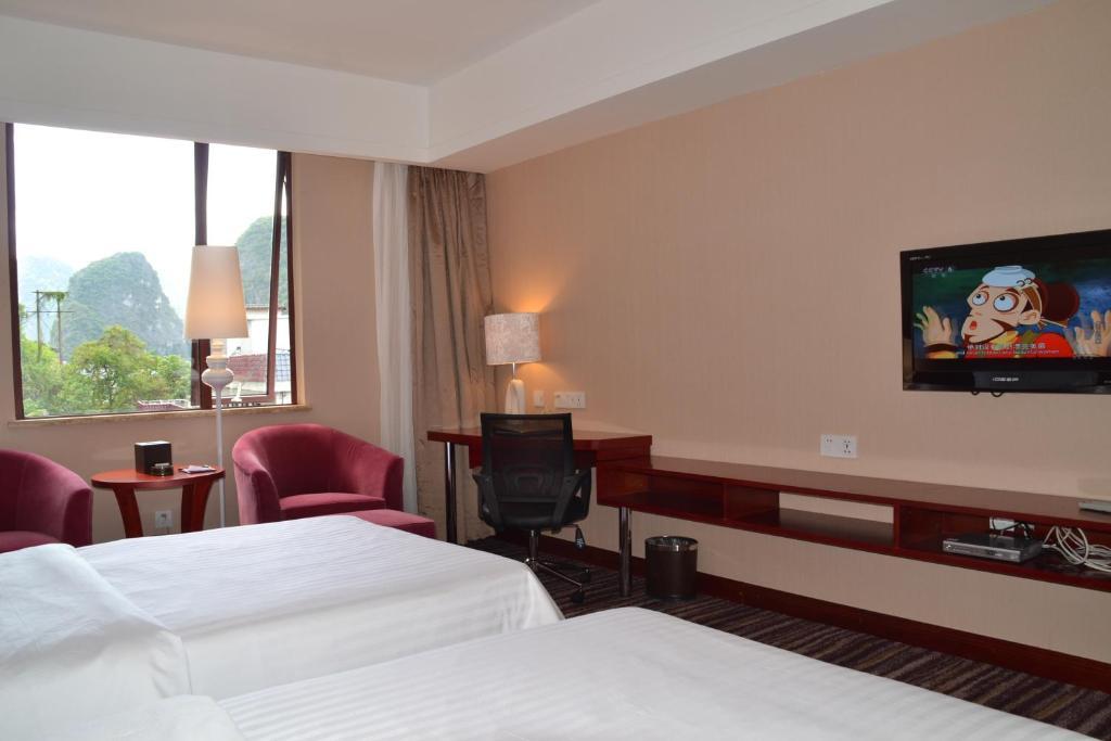 Elite Garden Hotel Yangshuo Rum bild